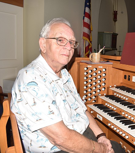 Dale Hooey at the organ in 2021. File photo.