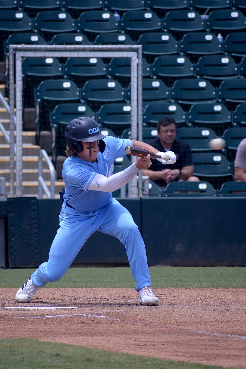ODA junior Giovanni Giuliani bunts in the first inning against North Florida Christian.