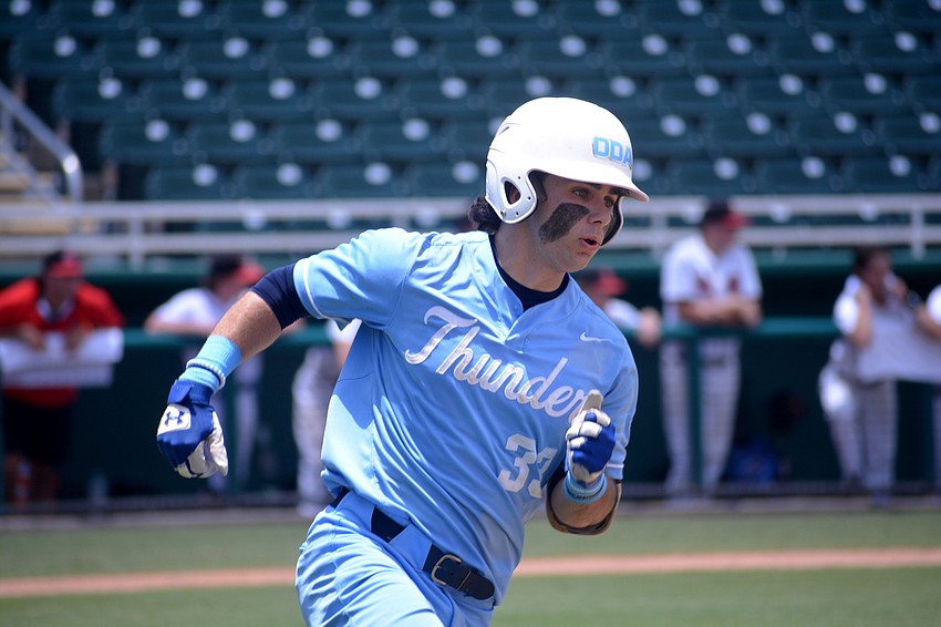ODA junior Luca Marino rounds first base after a base hit against North Florida Christian.