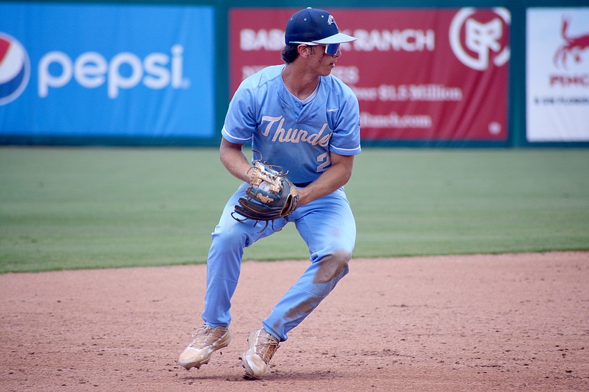 ODA senior Aidan Marino fields a ball and preps to throw to first base.