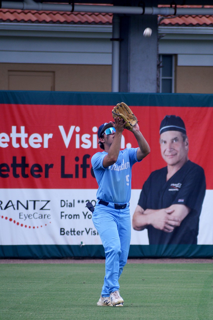 ODA senior Logan Tribble catches a fly ball in left field.