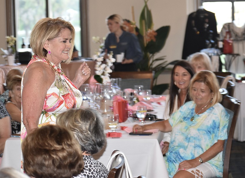 Patricia Harper shows off a colorful dress during Sparkle on the Runway.