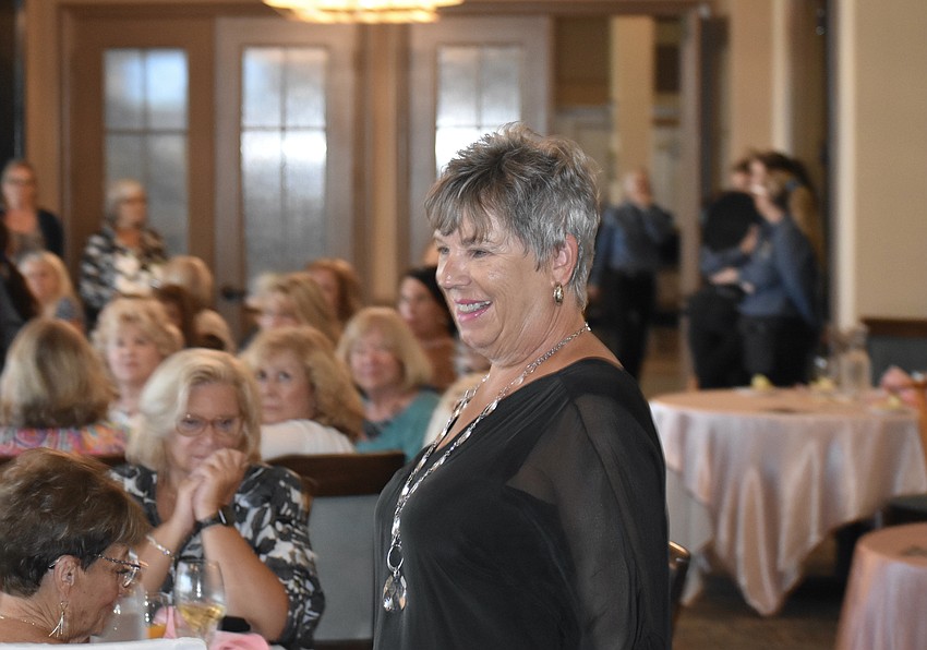 Model Ellen Hunt makes an entrance to show off an outfit.