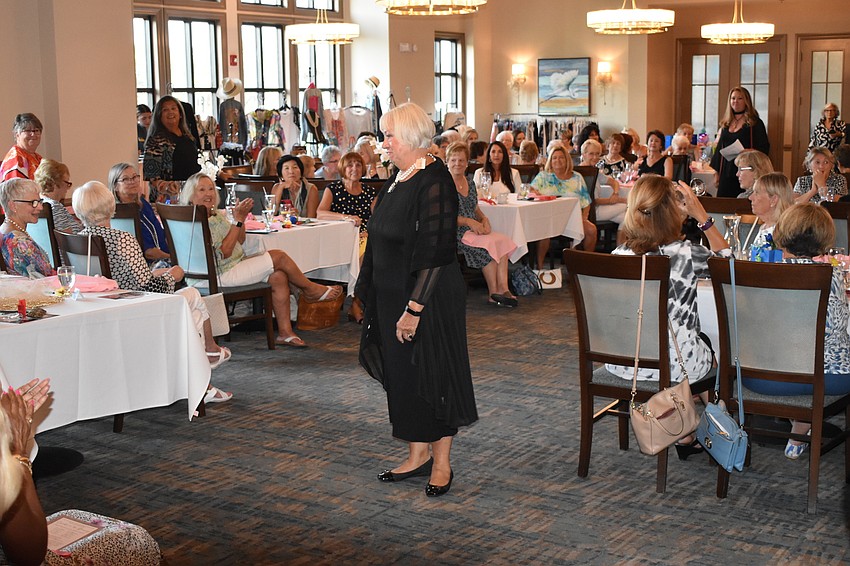 All eyes are on Kathleen Link as she shows off an outfit.