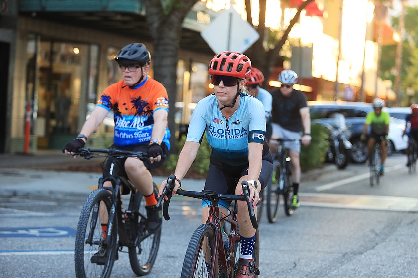 Karen Gamez rides through Main Street.