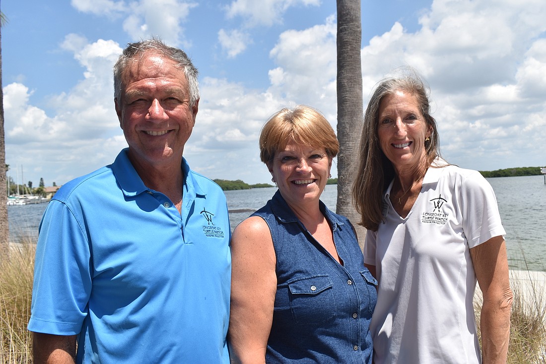 Longboat Key Turtle Watch president Tim Thurman, store manager Melanie Dale and vice president Cyndi Seamon