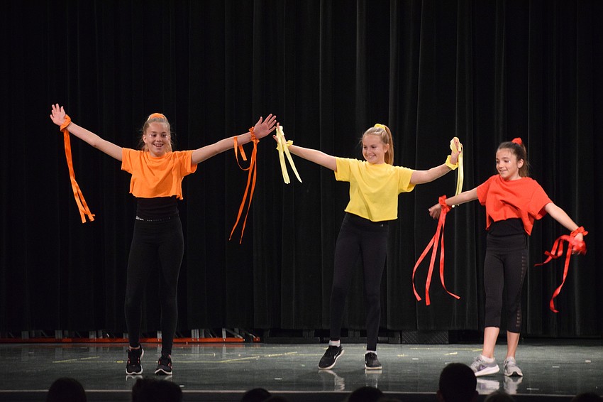 Fifth graders Isabella Lawton, Cora Kovatch and Stella Guido put together an original routine to perform.