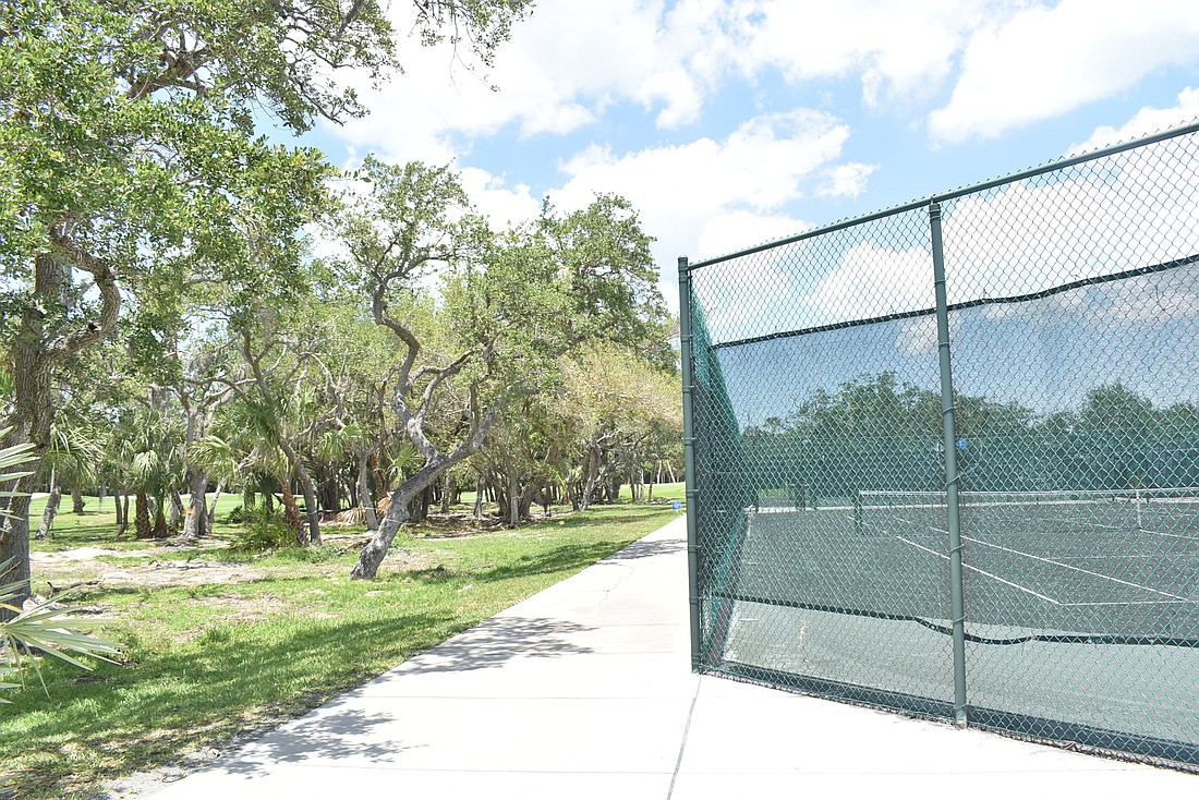 Four pickleball courts are proposed adjacent to the tennis courts.
