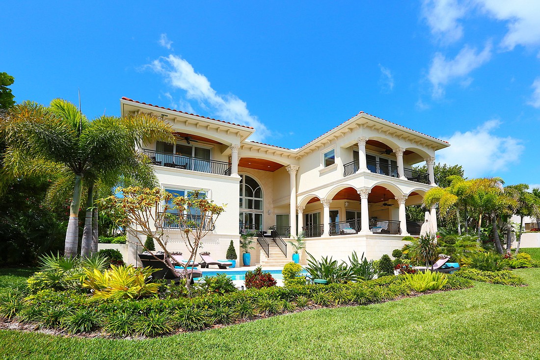 This home at 1570 Harbour Cay Lane has five bedrooms, six and a half baths, a pool and 5,918 square feet of living area. It sold for $3.65 million. Photo courtesy of Cheryl Loeffler