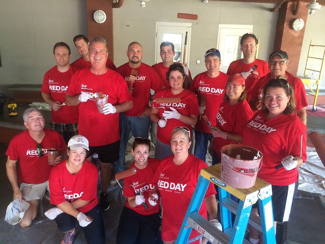 Keller Williams Select at Lakewood Ranch associates celebrate RED Day by volunteering at the Salvation Army in Sarasota. Courtesy photo