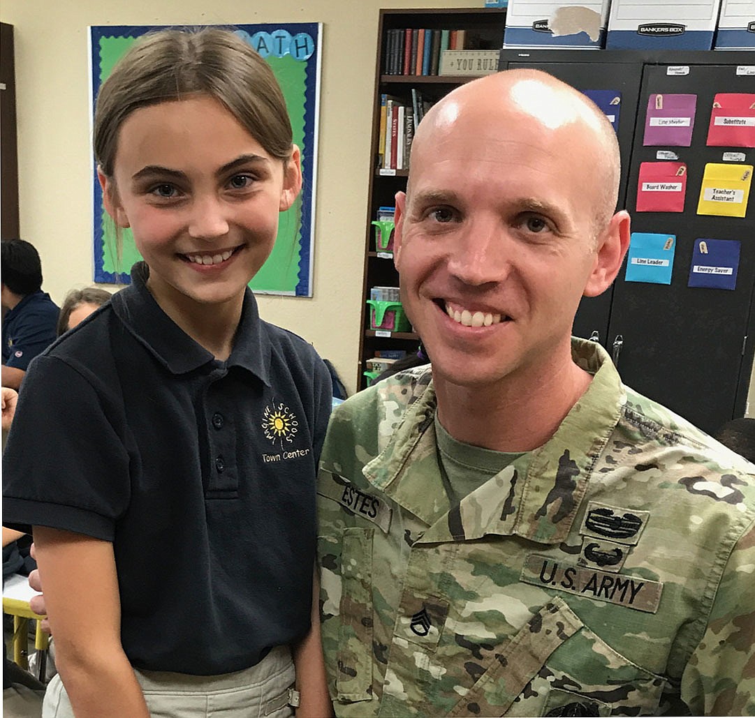 Hailey and Staff Sgt. James Estes. Photo courtesy of U.S. Army