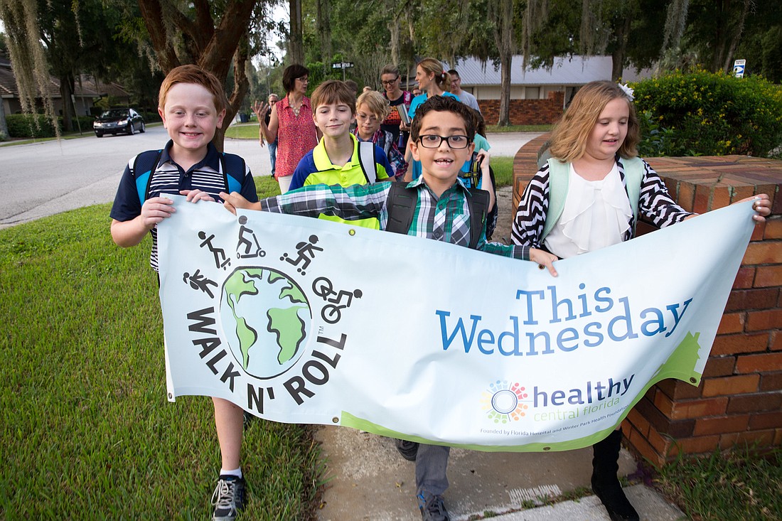 Local schoolchildren participate in the Walk &#39;n&#39; Roll program as they celebrate the 2017 National Bike to School Day back in May.
