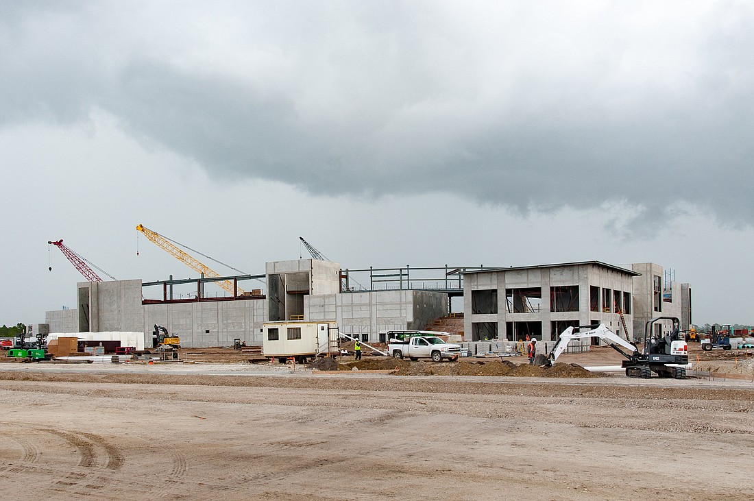 Developer tops out building near Braves stadium