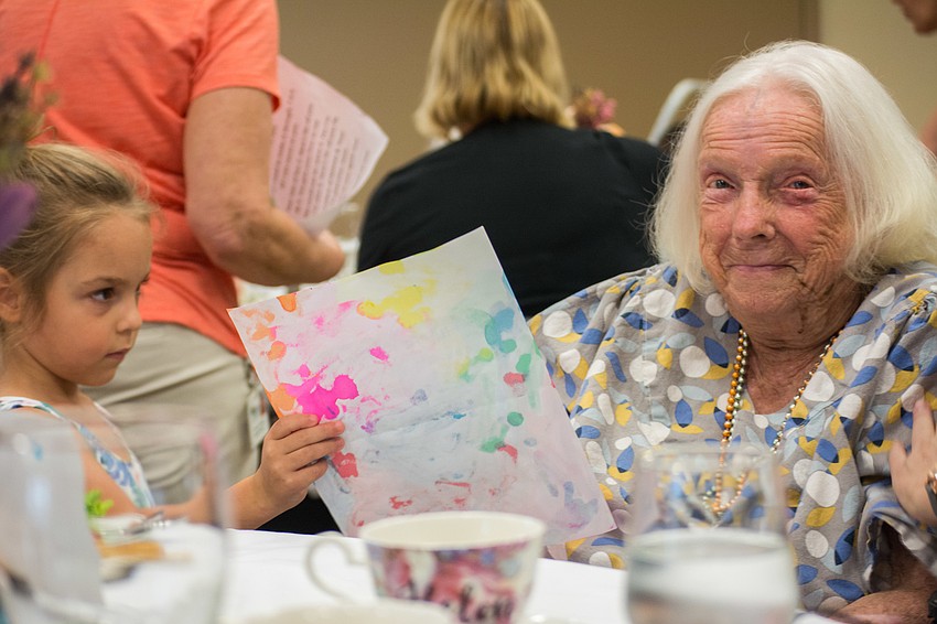 Helen Callahan receives a birthday card from the students of the Pines of Sarasota's Child Care & Learning Center.