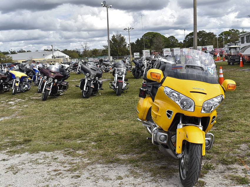 Motorcyclists parked their motorcycles in a special lot.