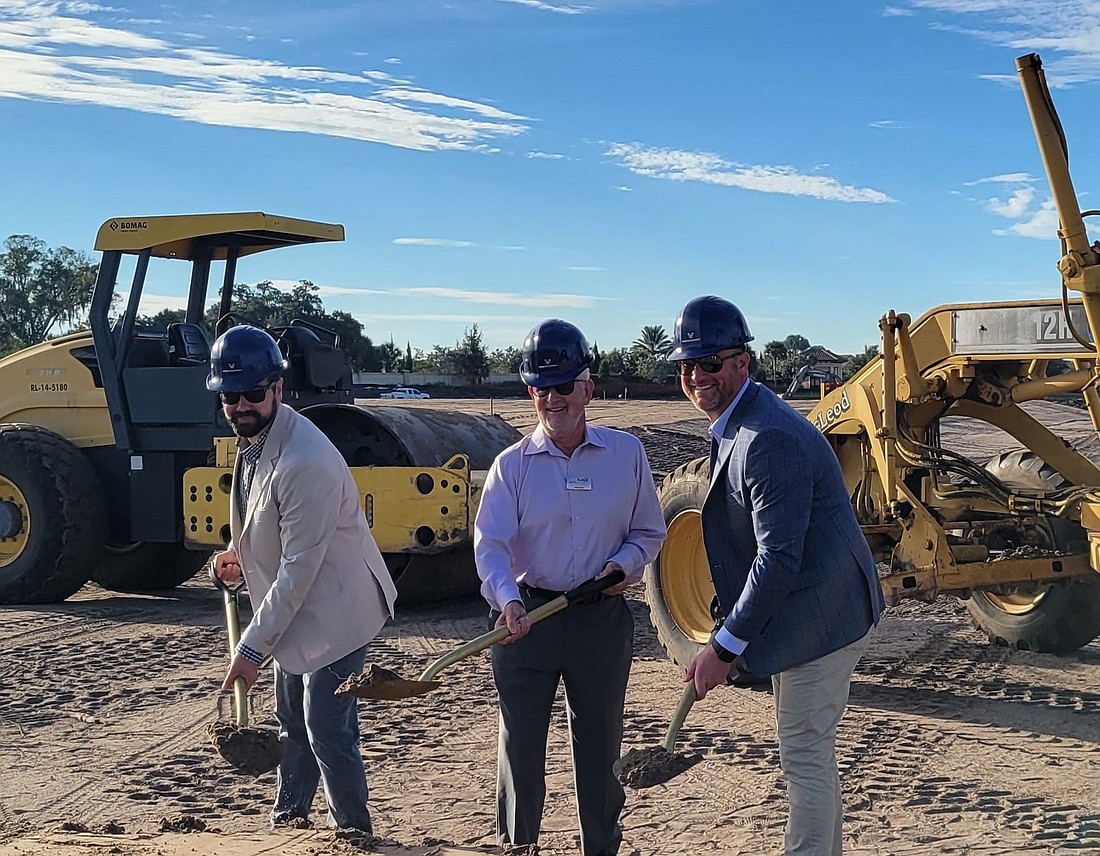 Pictured, from left, are WMG Development CEO Curt Frost, former Palmer Ranch resident and principal owner Ian Black and Senior VP of Development Craig Kopko.