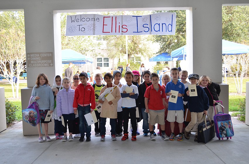 A second grade class arrives at Ellis Island at Phillippi Shores Elementary School. For five weeks students learned about their  heritage and how their families arrived in the United States.