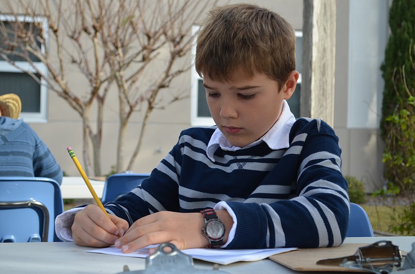 Jillian Hughes fills out her passport.