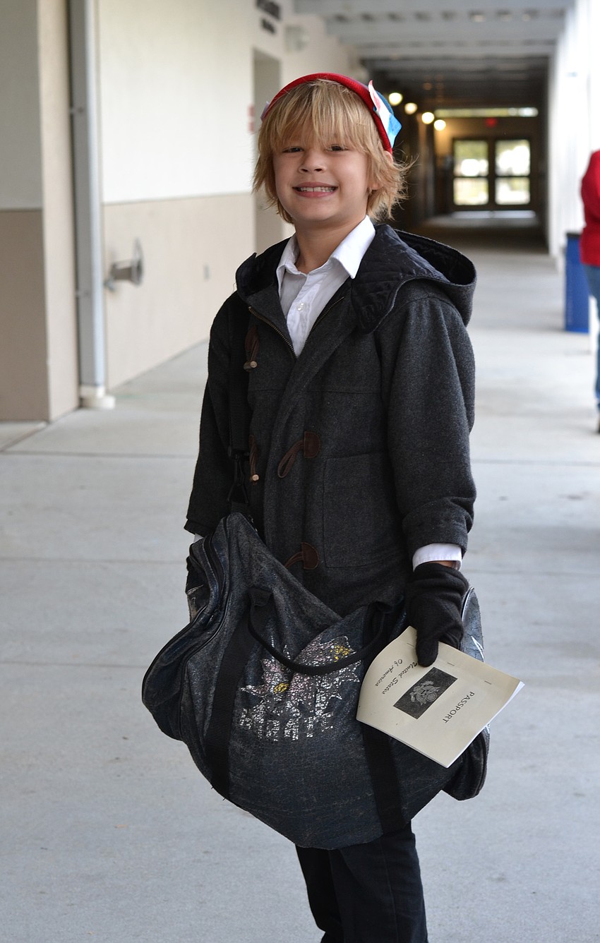 Lila Robertson packed stuffed animals for her pretend voyage to America.