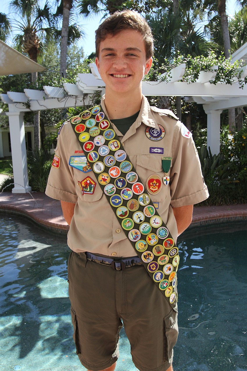 MAY: Owen Eakle  is proud of his sash sporting his many badges.