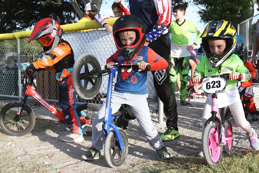 AUGUST: Young racers get ready to hit the track on the BMX rides.