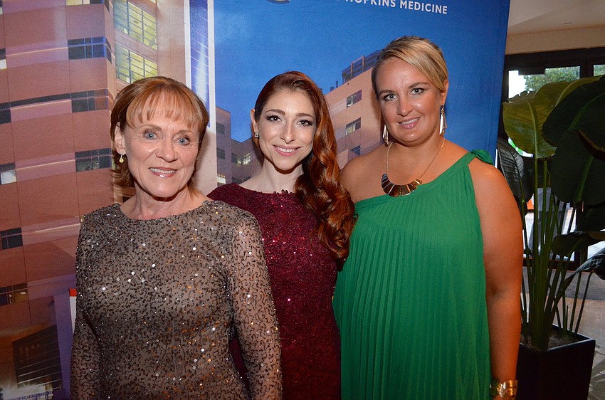 Kay Aidlin, Chairwoman Jenni Ross and Suzi Minahan