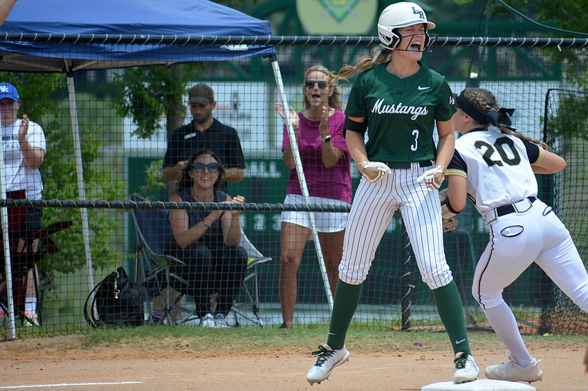 Lakewood Ranch junior Cassidy McLellan lets out a yell after hitting a triple in the Mustangs' 11-3 win over Western High.