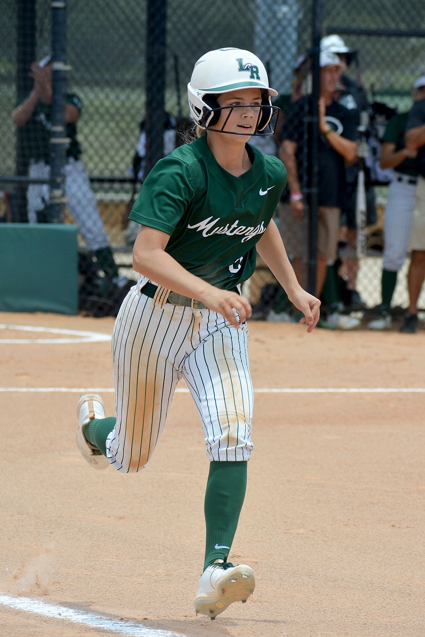 Lakewood Ranch senior Kelsey Vogel sprints to first base to leg out a single against Western High.