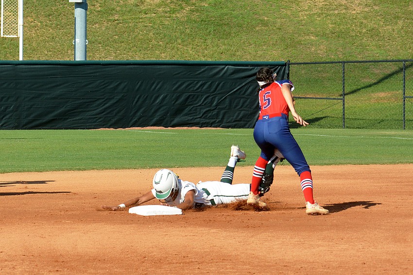 Lakewood Ranch High senior Sydney McCray slides into second base for a steal against Lake Brantley High.