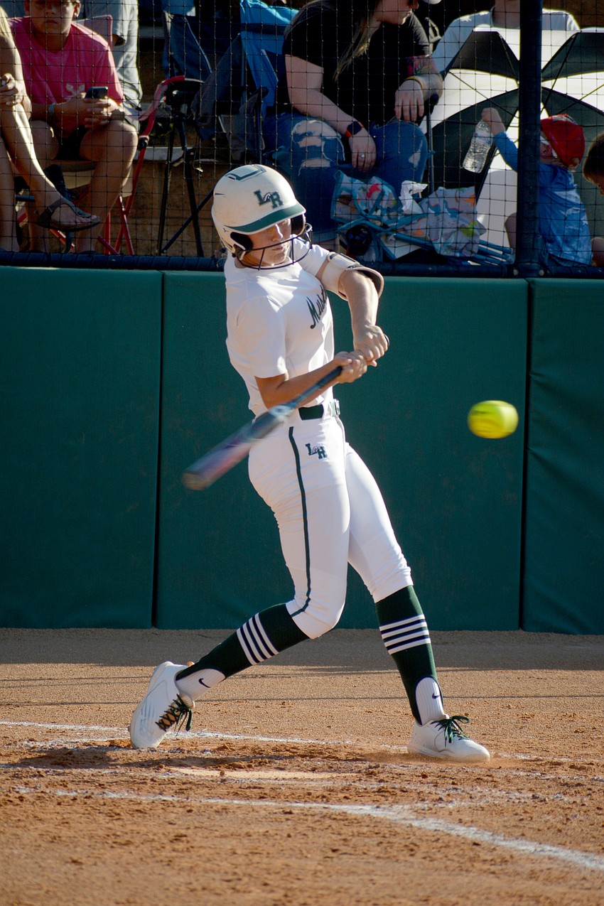 Lakewood Ranch High junior Addyson Bruneman takes a big cut against Lake Brantley High. Bruneman went 2-3 with a double and three RBIs.