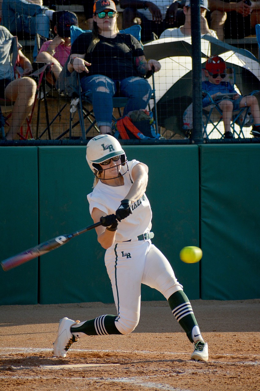 Lakewood Ranch High senior Grace Hogie socks a triple to kickstart a five-run fourth inning against Lake Brantley High.