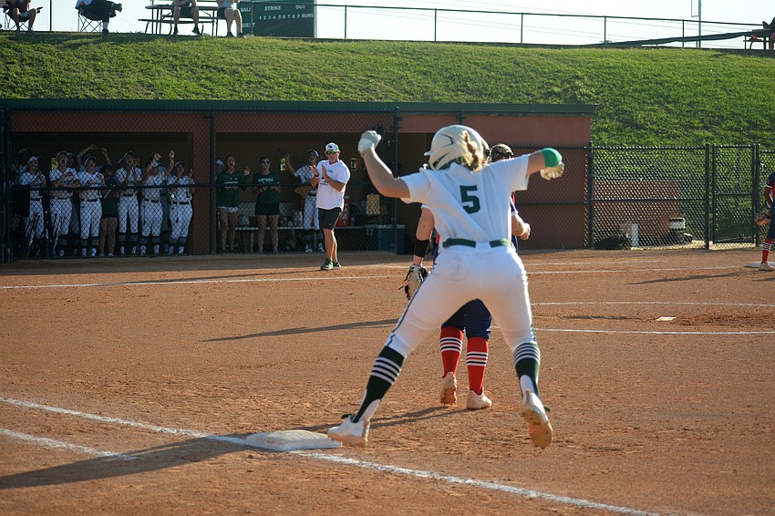 Lakewood Ranch senior Ella Coiner leaps for joy after recording an RBI single against Lake Brantley High.