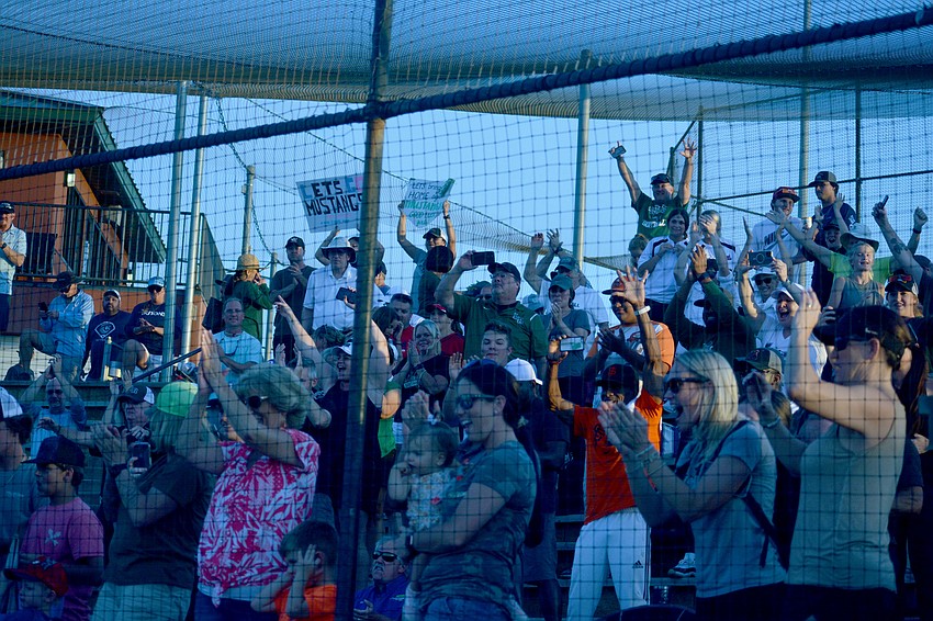 The Lakewood Ranch High softball fans in attendance at Legends Way Ball Fields in Clermont give the Class 7A state champion Mustangs a hearty cheer.