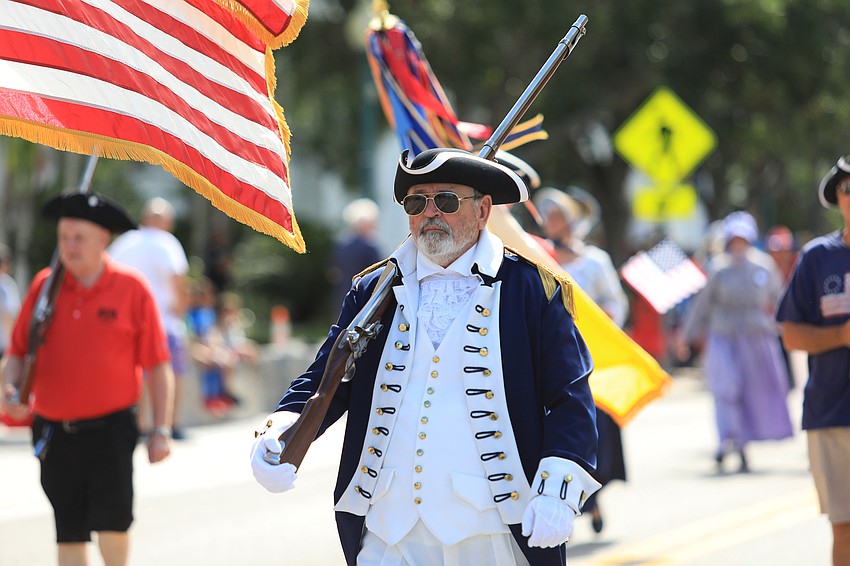 John Fitzpatrick walks with the Sons of the American Revolution.