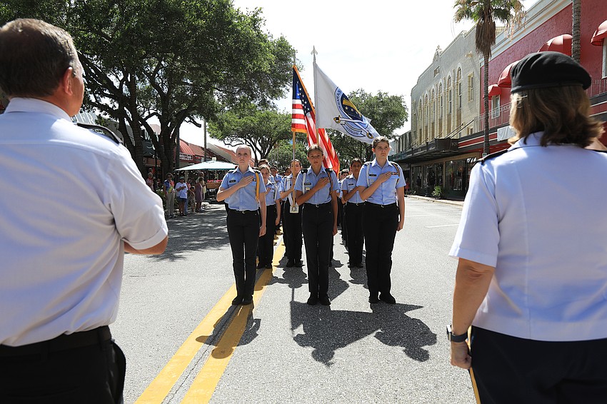 Sarasota Military Academy Prep students stop to pledge allegiance.