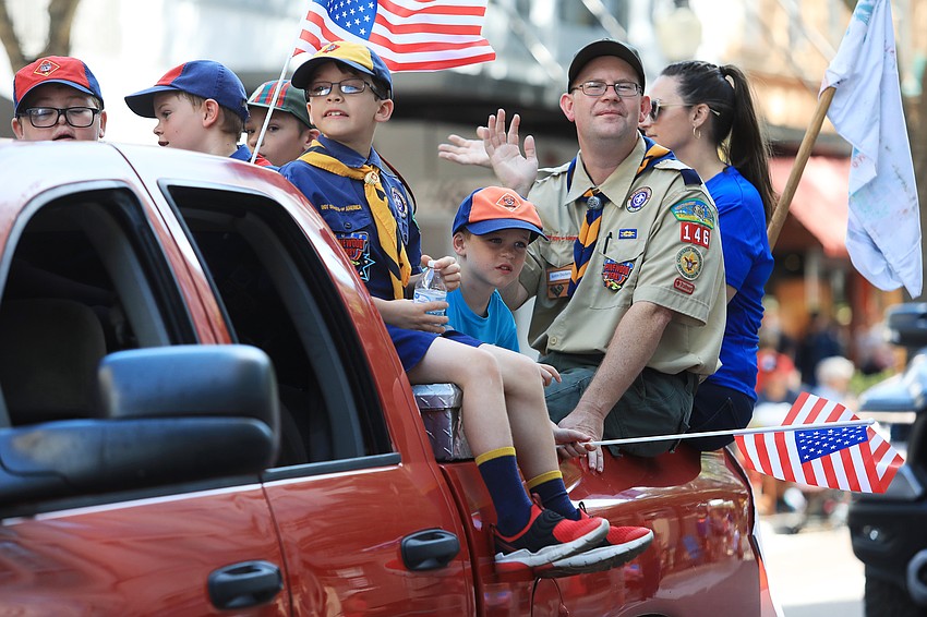 Boys Scouts of America troops enjoy the ride in the back.