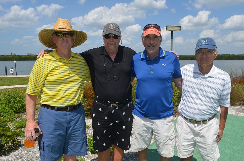 Teammates Ken Simpson, Ted Janssen, Allen Ross and Yo Kimura
