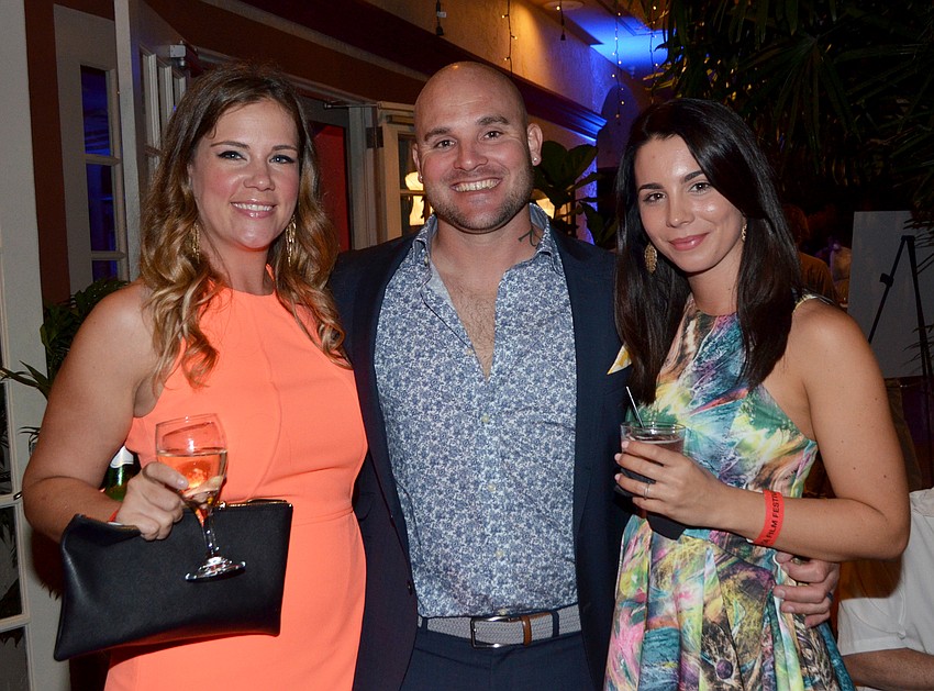 Beth and Ryan Jacobson with Lexi Huelsman