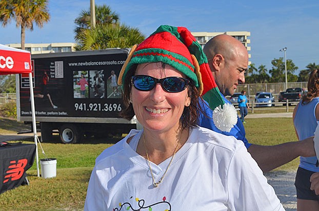 Patti-Carpenter-wears-a-festive-hat.