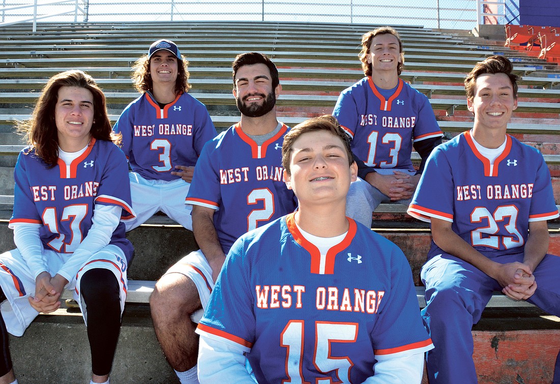 Brothers Logan Mueller, left, and Liam Mueller, Zach Malaussena and Sam Malaussena, and Daniel Luette and Robert Luette have combined to create a family atmosphere on the West Orange boys lacrosse team.