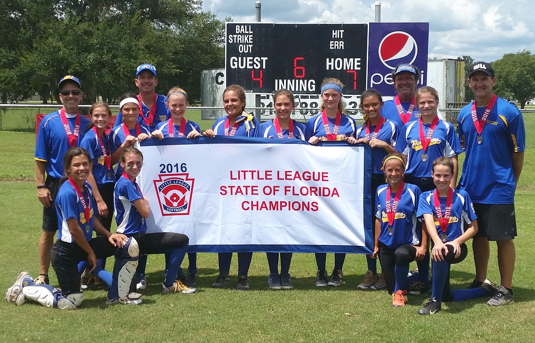 The Windermere Little League softball team is all smiles after beating Fort Myers in the state championship game.