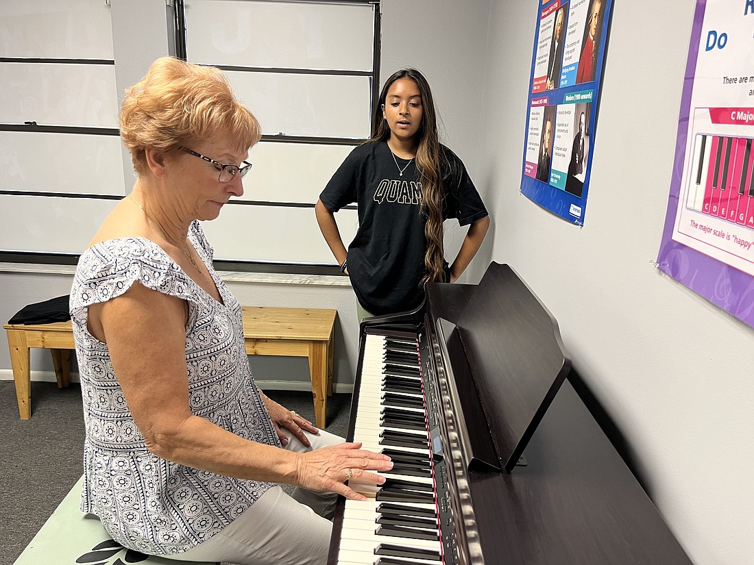 Lakewood Ranch&#39;s Sabine Kvenberg, who also is a teacher at the Music Compound, takes Lakewood Ranch&#39;s Jasleen Kaur through a singing lesson. Both have sung the national anthem before polo matches at the Sarasota Polo Club.
