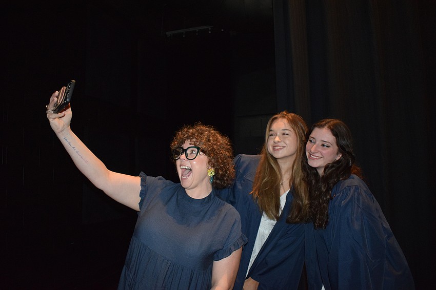 Lisa Clay, the co-director of college counseling, takes a selfie with Ava Newcome and Chloe Kidd. 