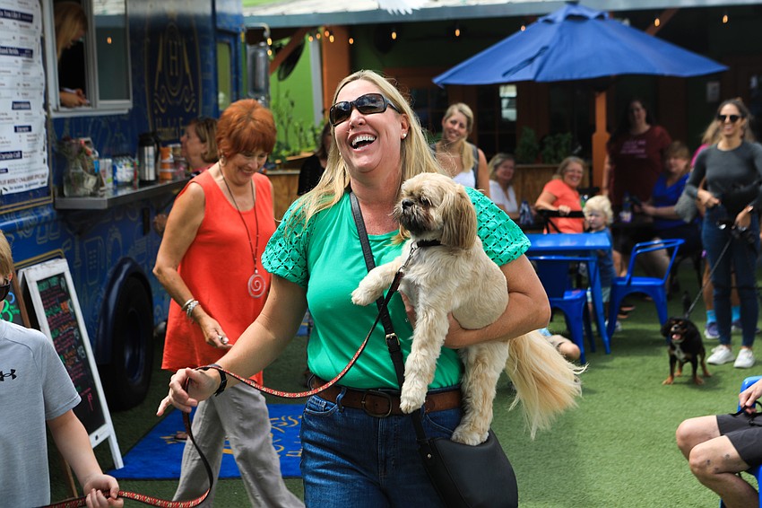 Debra Kiner and Chewie accept their award.