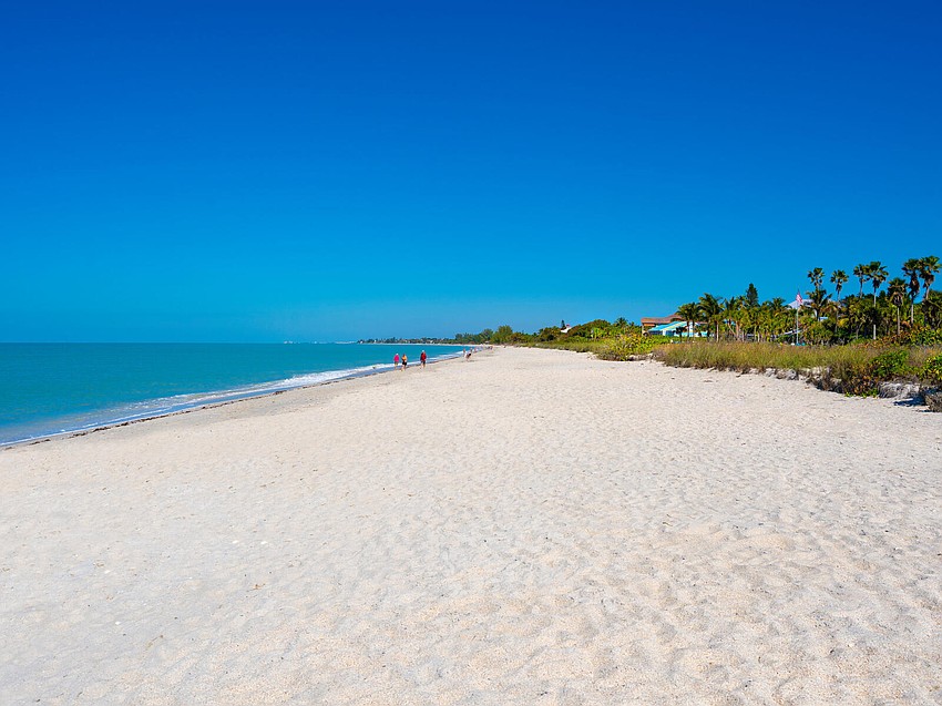 The home at 513 Casey Key Road has direct access to the beach.