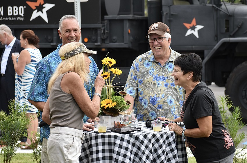 Robert and Pamela Rice of Copperleaf, and Jane Cyran and Ron Cyran of Eagle Trace, enjoy the live music.