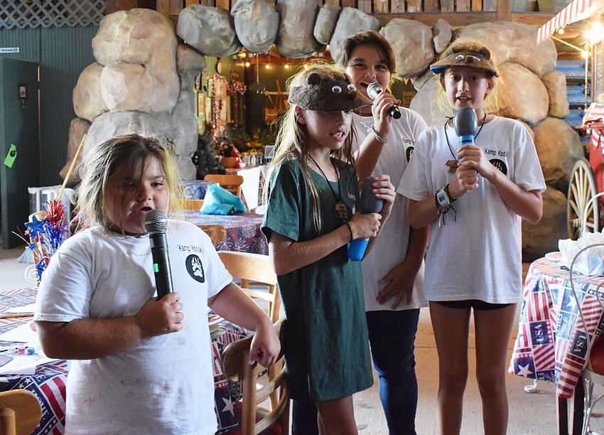 Emmy Dyer, Sidney Lamarre, Mia Dyer and Leighton Cracchiola sing 