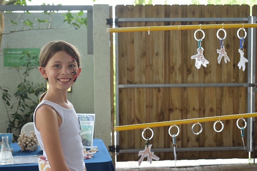 Rebecca Winemiller checks out the coral reef exhibit.