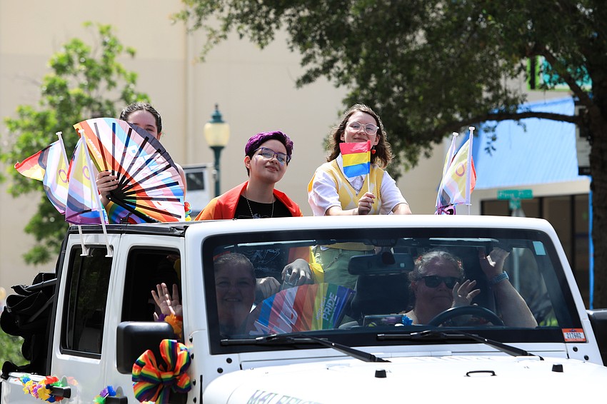 Rachel Leeper, Em Ortiz and Lily Amos cruise through Main Street.