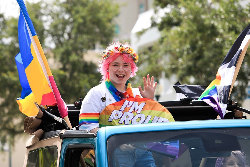 Niko Goesel waves from her car.